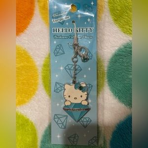 LAST WEEK!! REDUCED ~ NEW Hello Kitty Dec. Birthstone Charm w/Baby Ring attached